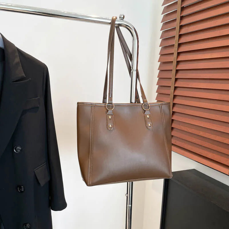 Korean style horizontal square shoulder underarm bag in PU with sandwich pocket, shown in beige colour.