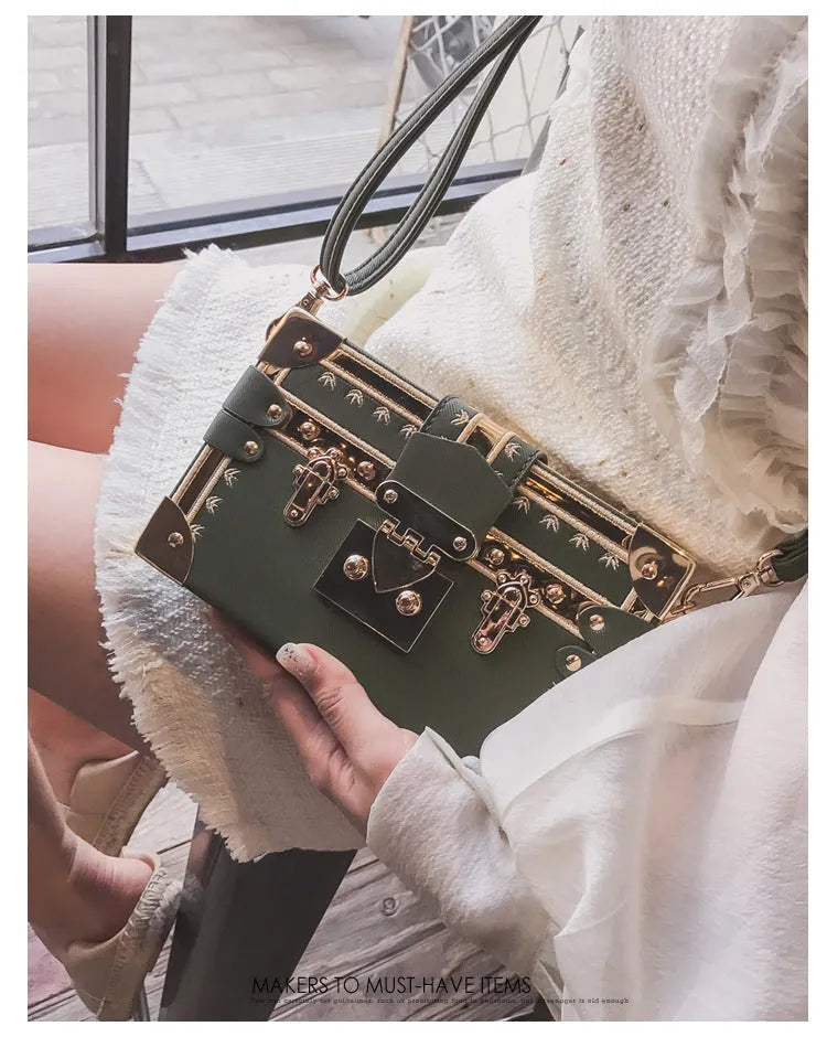 Women's hard PU shoulder bag with rivet decoration and hasp closure in black or green flap style