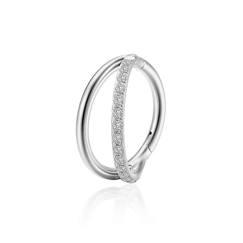 Titanium alloy fork prong nose ring on a white background, showing silver and gold colour options