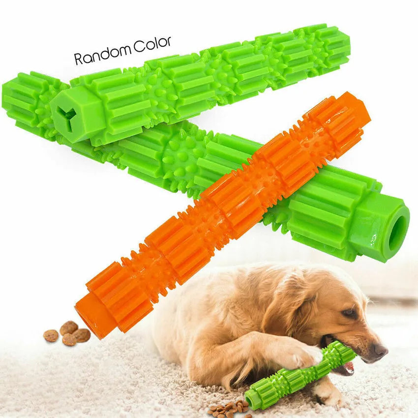 Green and orange durable rubber dog chew toy with textured surface and treat dispensing hole.
