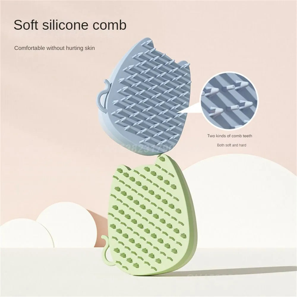 Blue silicone pet comb with dual-texture bristles for grooming cats and dogs on a white background.