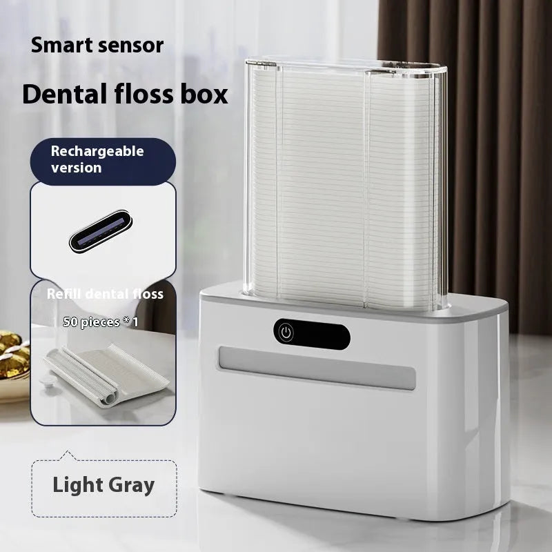 Intelligent induction dental floss box in dark grey colour showing automatic pop-up mechanism with rechargeable battery