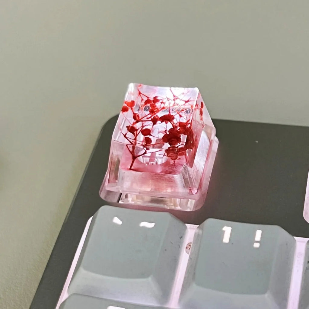Transparent resin mechanical keyboard keycap with starry sky design in green colour