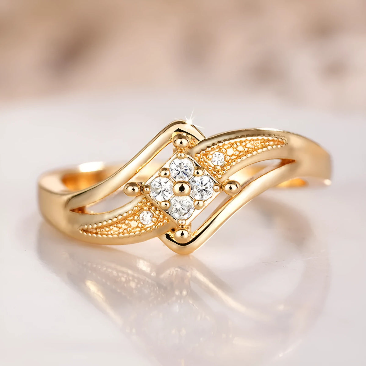 Copper diamond ring with geometric ornament and micro inlaid zircon in yellow gold colour