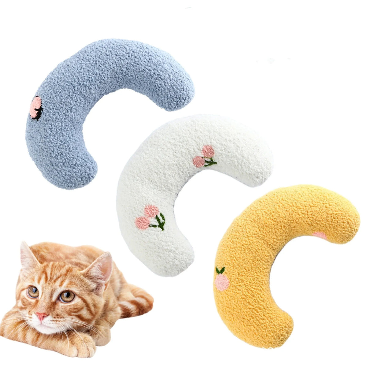 Small blue half-donut shaped pet pillow bed for cats or small dogs on a carpet.