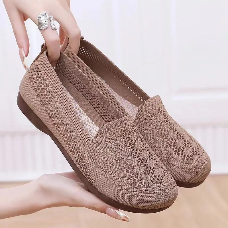 Women's beige low-top tennis shoes with mesh upper and anti-skid sole for wide feet.