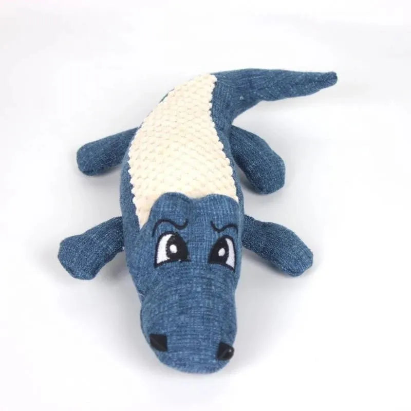 Corn grid textured plush pet toy in blue, green and red colours with biting sound feature