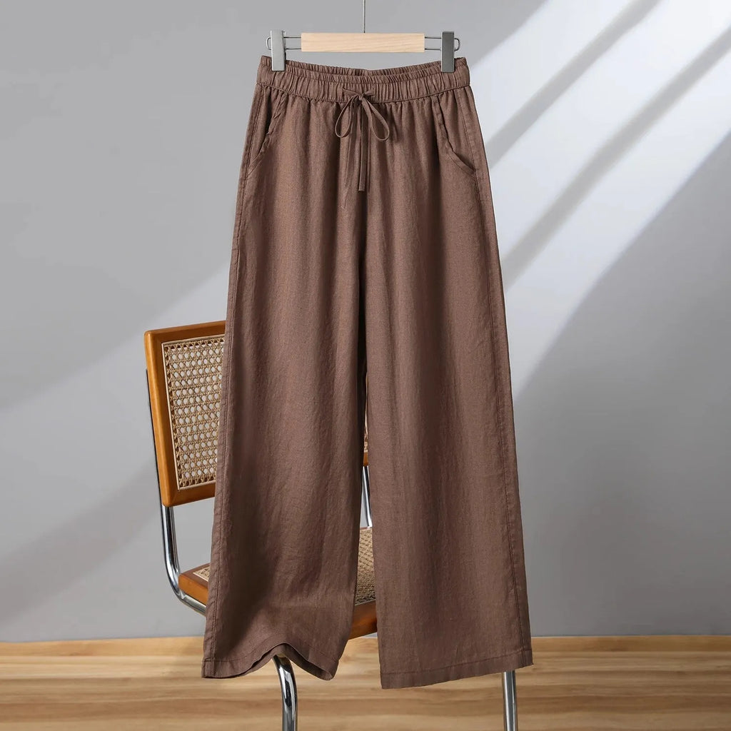Women's straight-leg casual trousers with elastic waist and drawstring detail in polyester fabric