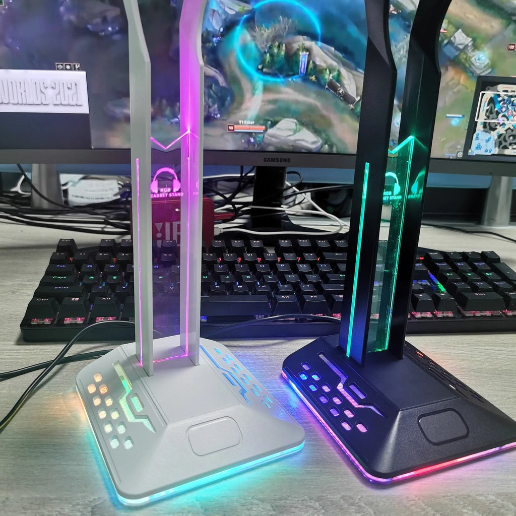 RGB headset bracket with dual USB ports and colour-changing LED lighting on a desk