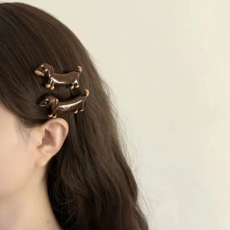 Dachshund dog shaped hair clips with electroplated finish, delicate loose design