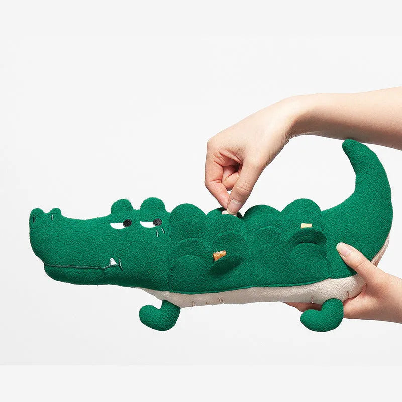 Green plush toy dog measuring 35cm long on a white background