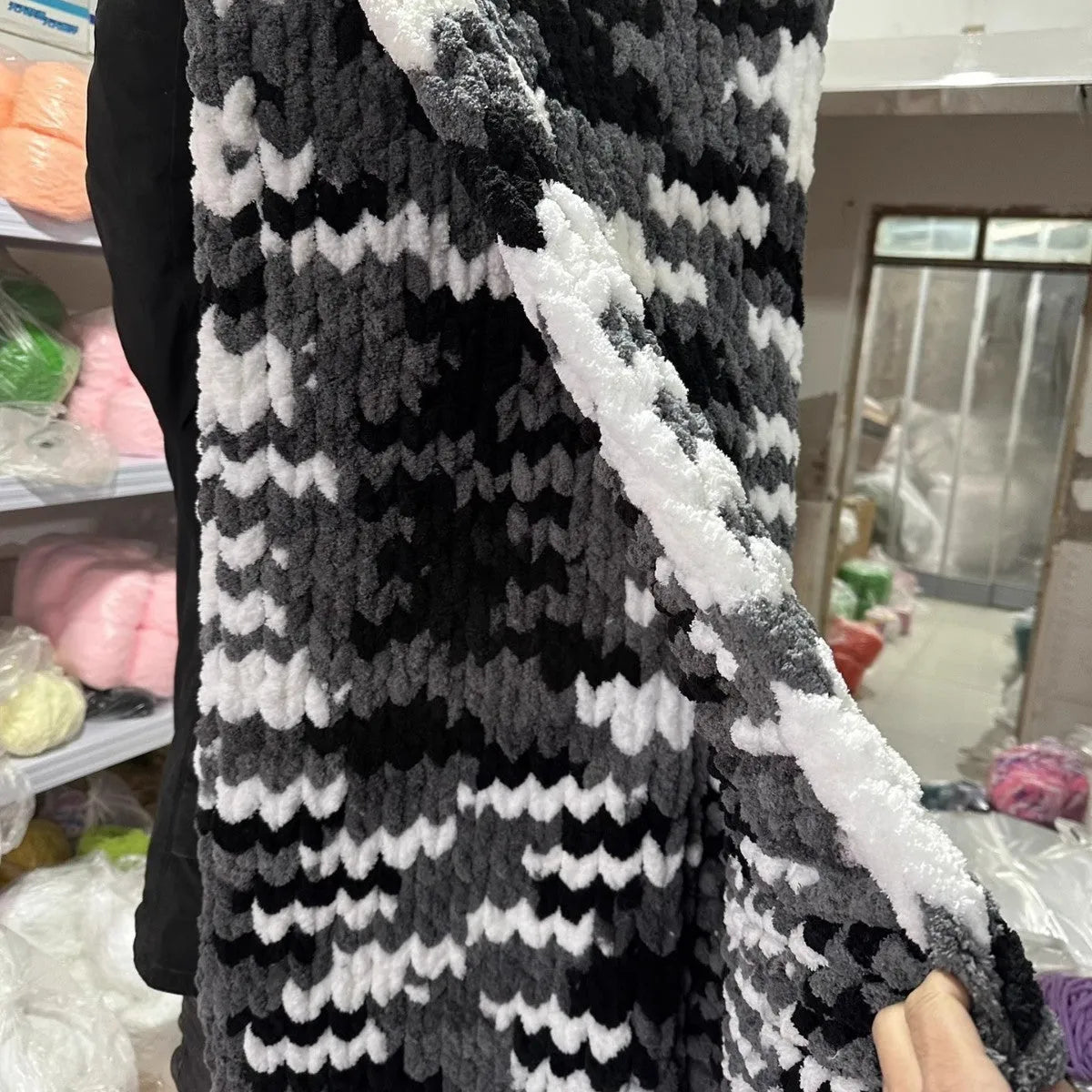 Coarse yarn chenille knitted blanket with braided gravity edge in modern simplicity style
