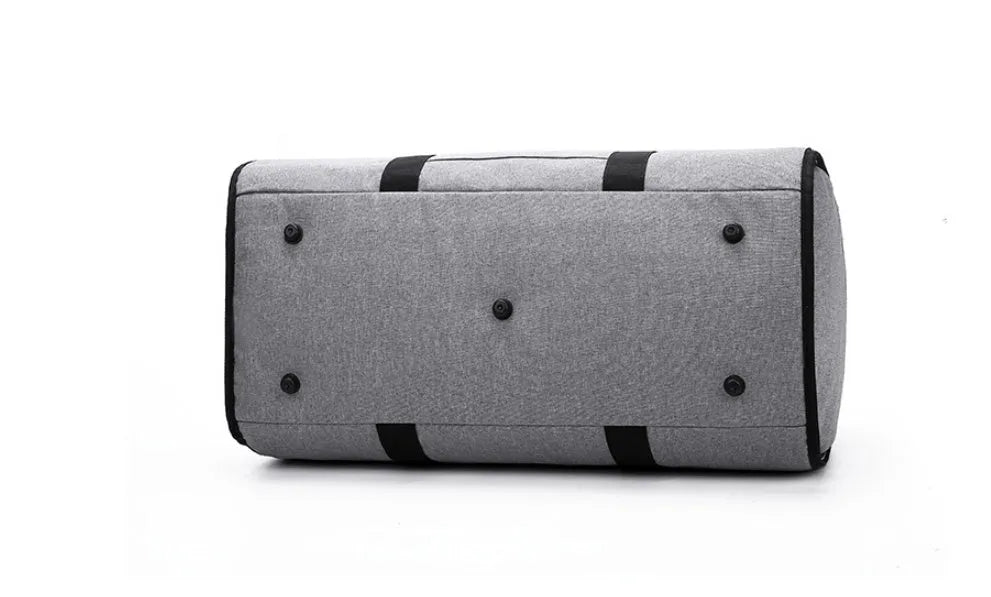 Cylinder-shaped travel bag in red, light grey, blue, or black with a zipper opening and Oxford cloth material.