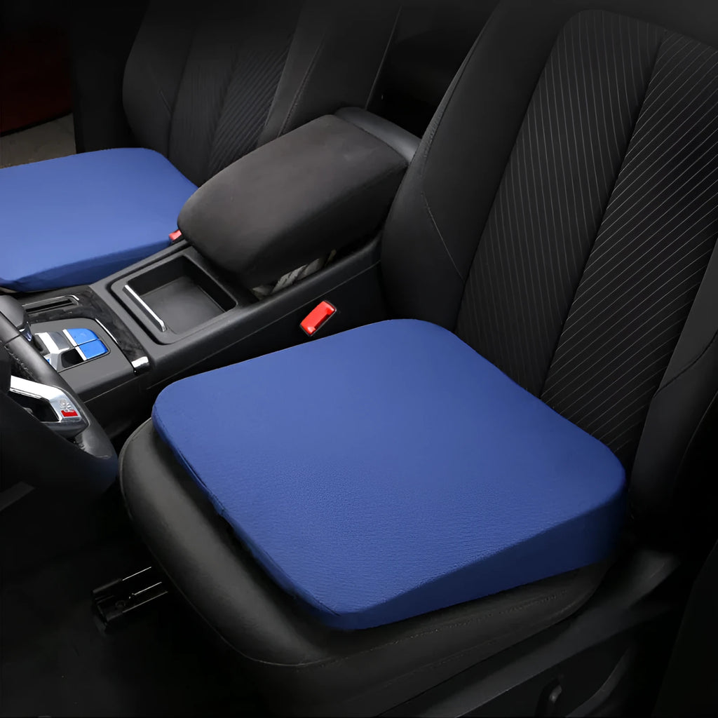 Black car seat heightening cushion with thick 6cm foam build on a car seat