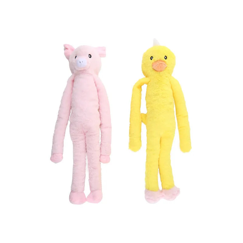 Large pink and yellow plush dog toy with squeaker and rattle paper for golden retriever chewing