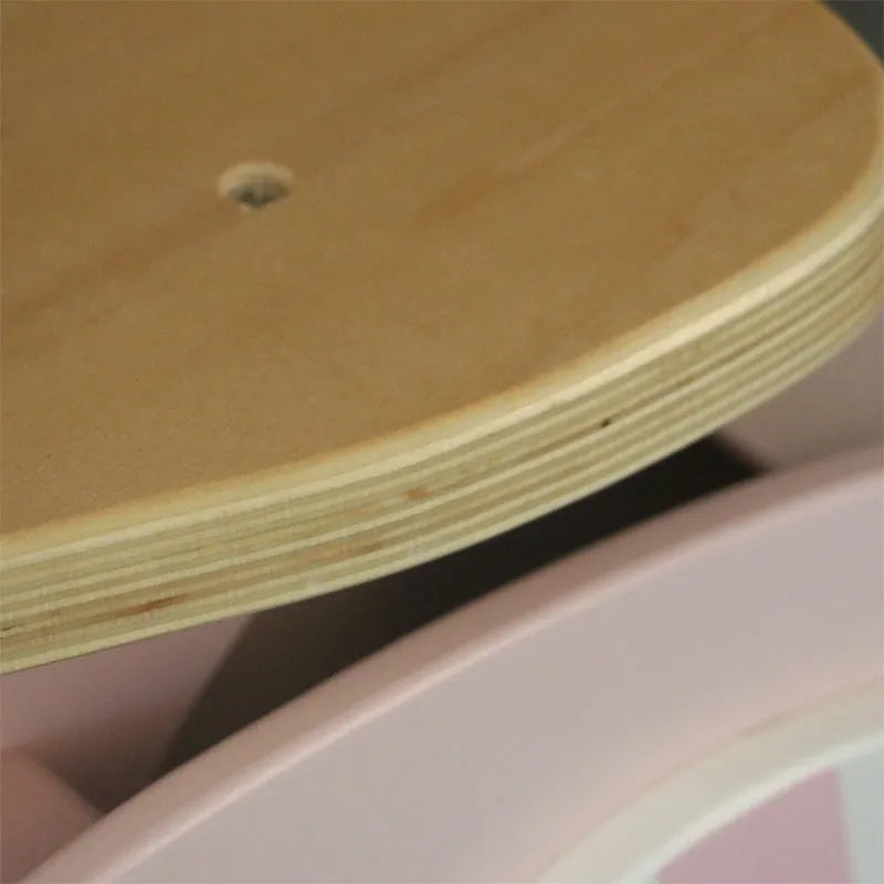 Pink wooden balance scooter for toddlers and children aged 1-6 years.