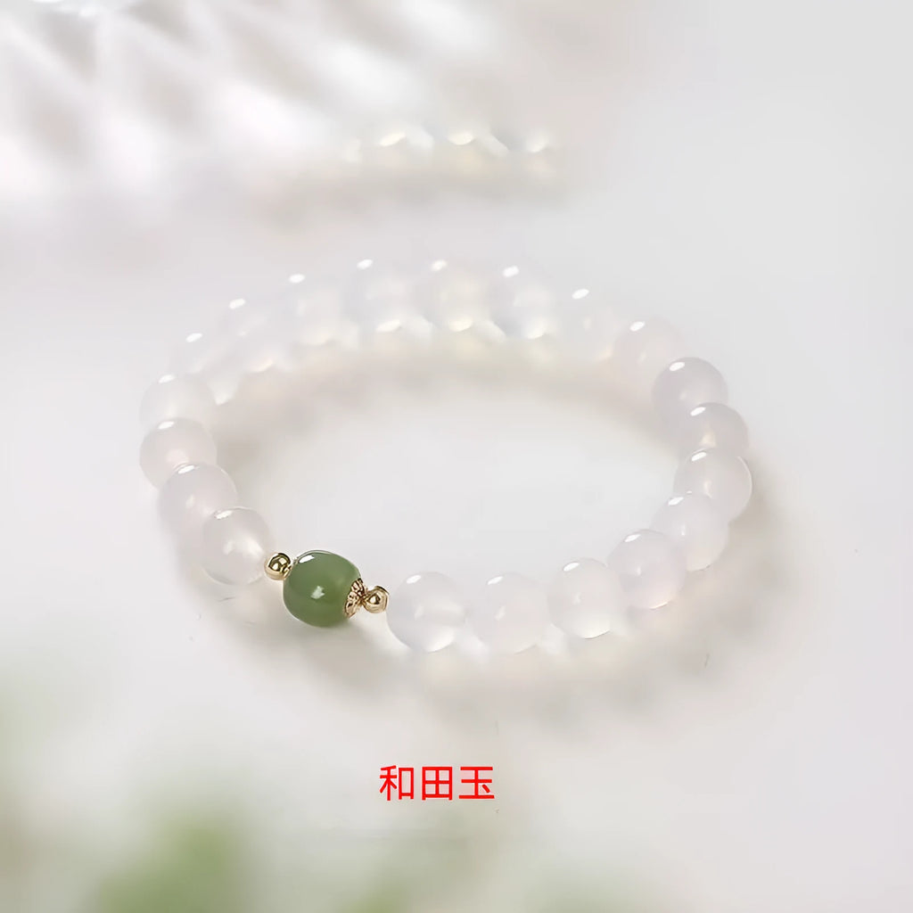 Handmade white agate and Hetian jade bracelet with crystal beads and cinnabar inlay detail