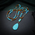 Turquoise water drop imitation mineral pendant on mixed material ball bead necklace chain