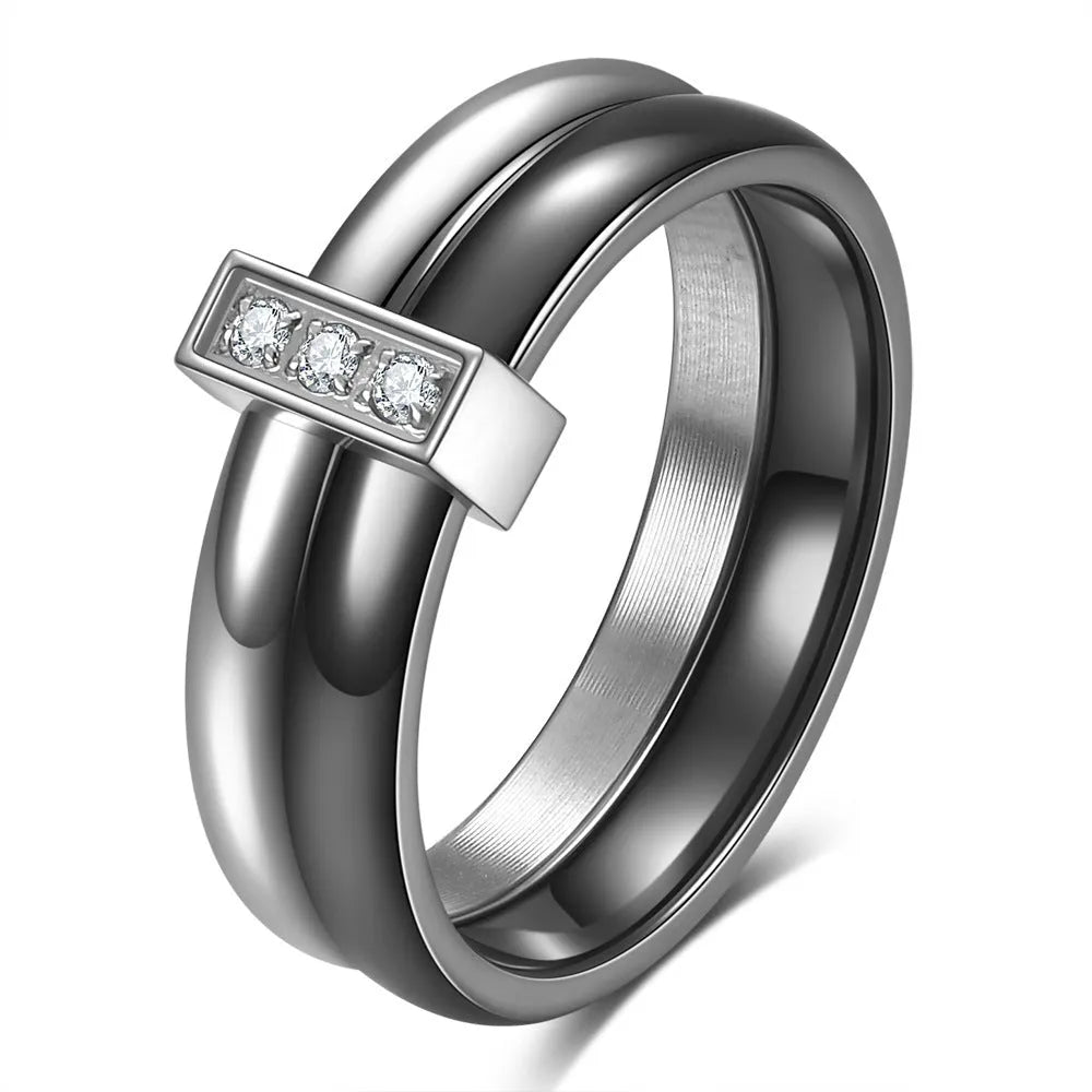 Geometric ceramic women's ring with glossy stitching and zirconium inlays in steel black finish