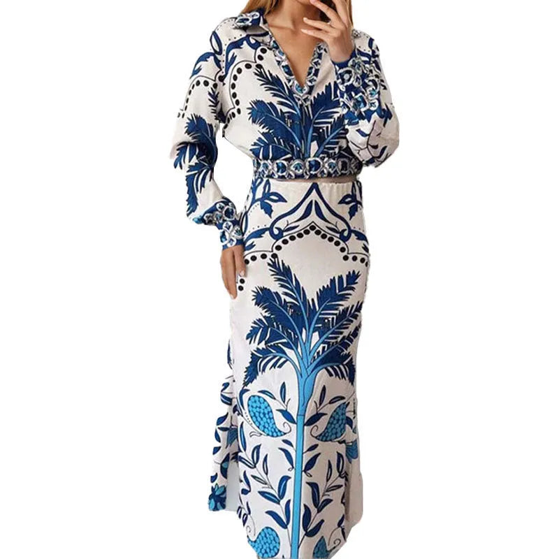 Women's long sleeve top and long skirt two-piece co-ord set in a solid colour.