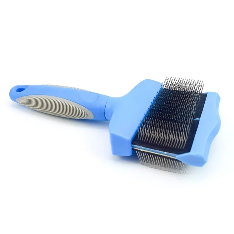 Double-sided pet grooming brush with stainless steel pins in blue or pink, showing ergonomic handle and pin details