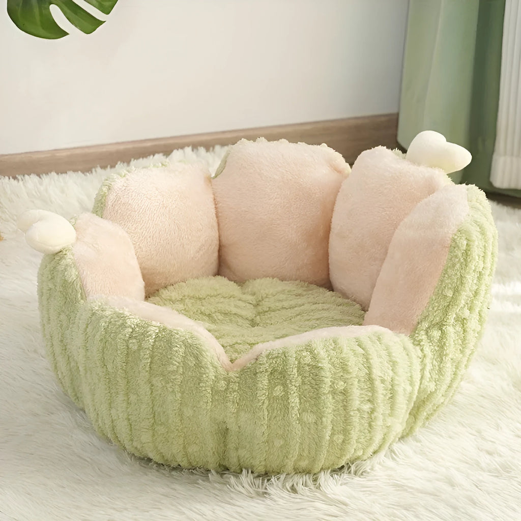 Soft green cactus-shaped pet kennel for cats and dogs on a wooden floor.
