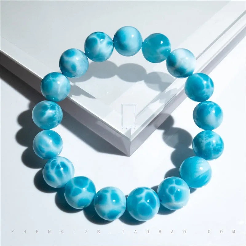 Handcrafted Bodhi bead bracelet with natural crystal sea-pattern stones and pearl accents in Maillard style