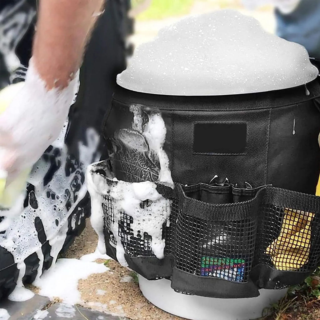 Black cylindrical polyester storage bag mounted on 5 gallon barrel for car washing and fishing gear organisation