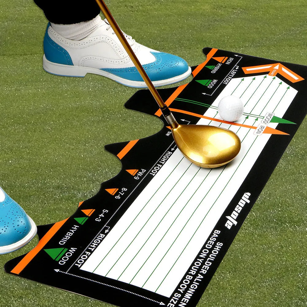 Black rectangular neoprene golf swing stance posture training pad on a green surface.