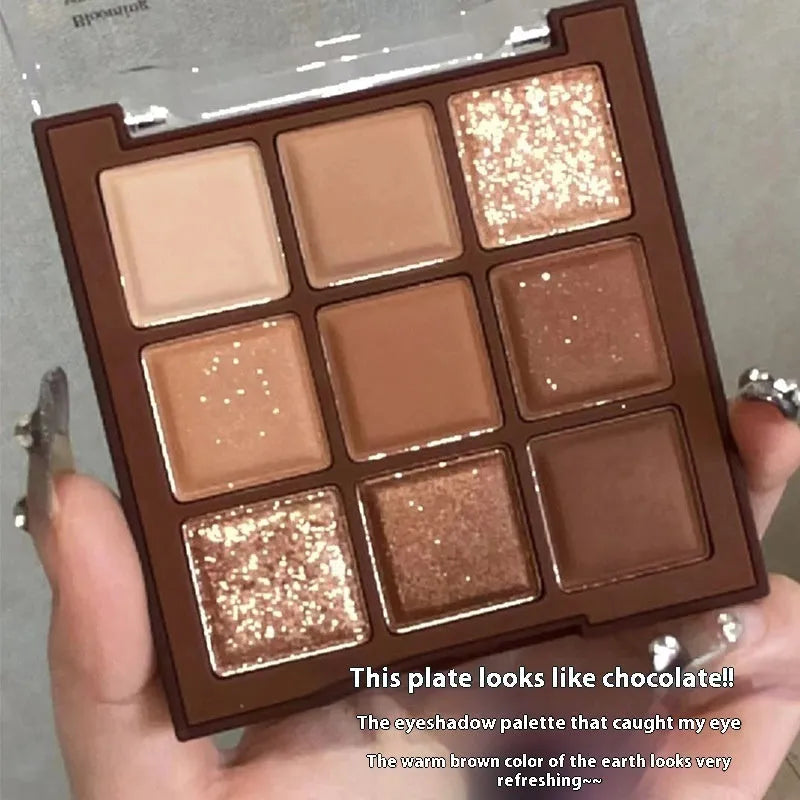 Nine colour eyeshadow palette in plastic case with sunset coral, red brown, cocoa and chocolate brown shades