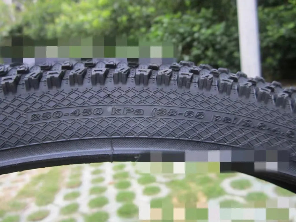 Mountain bike ultralight puncture proof tyre showing tread and white label sidewall option.