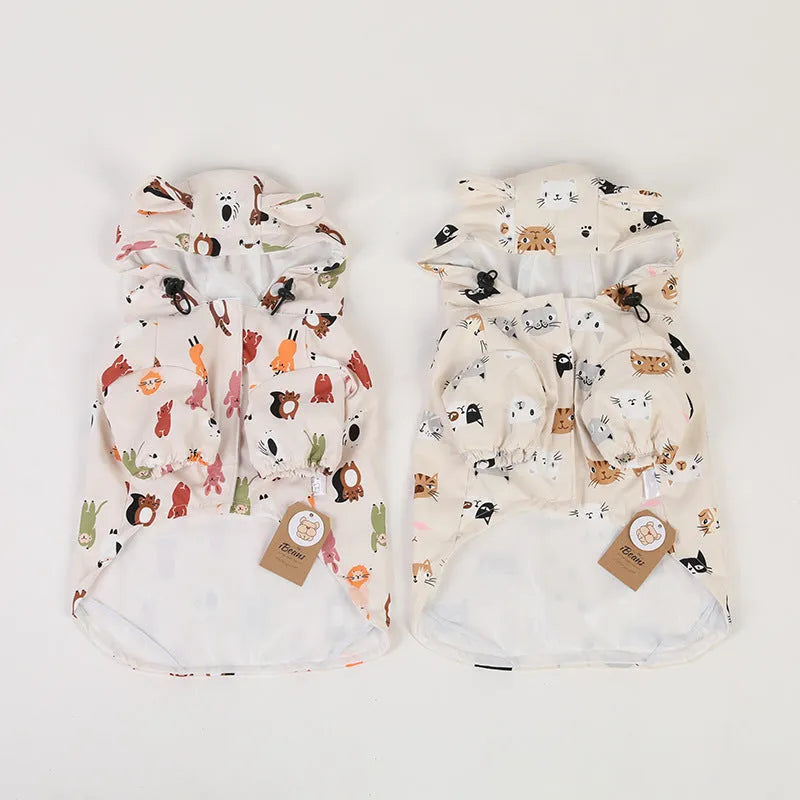 Beige cartoon dog raincoat with waterproof PU coating shown in small animal or cat head design