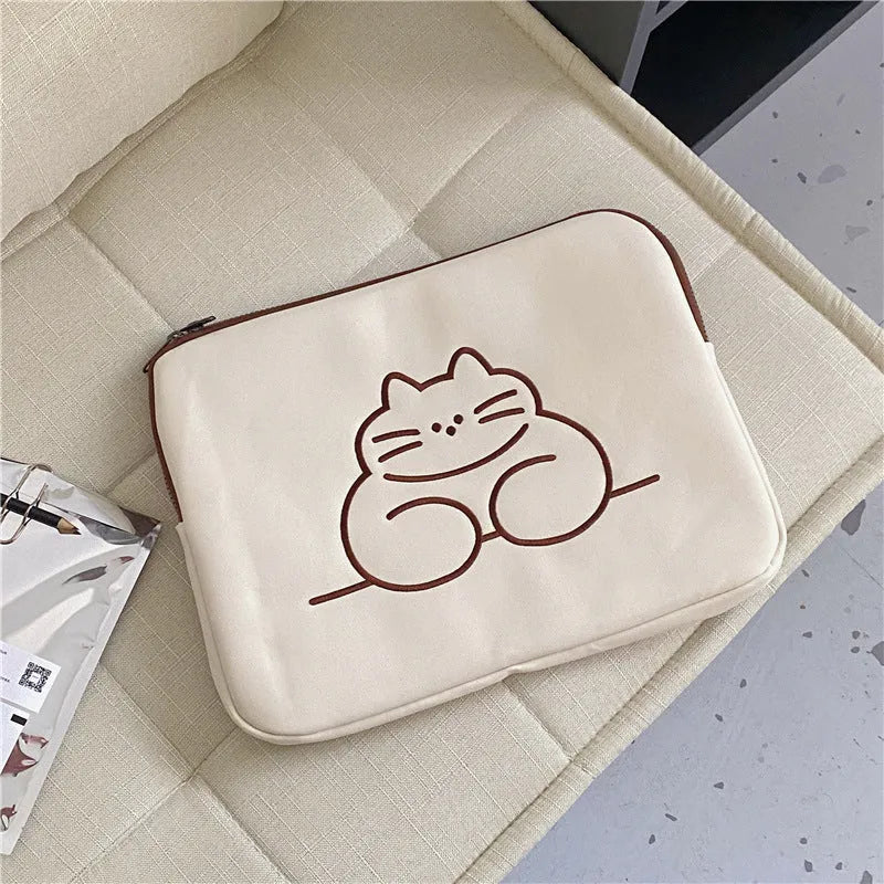 Animal embroidered tablet protective sleeve in nylon with zip opening showing size comparison