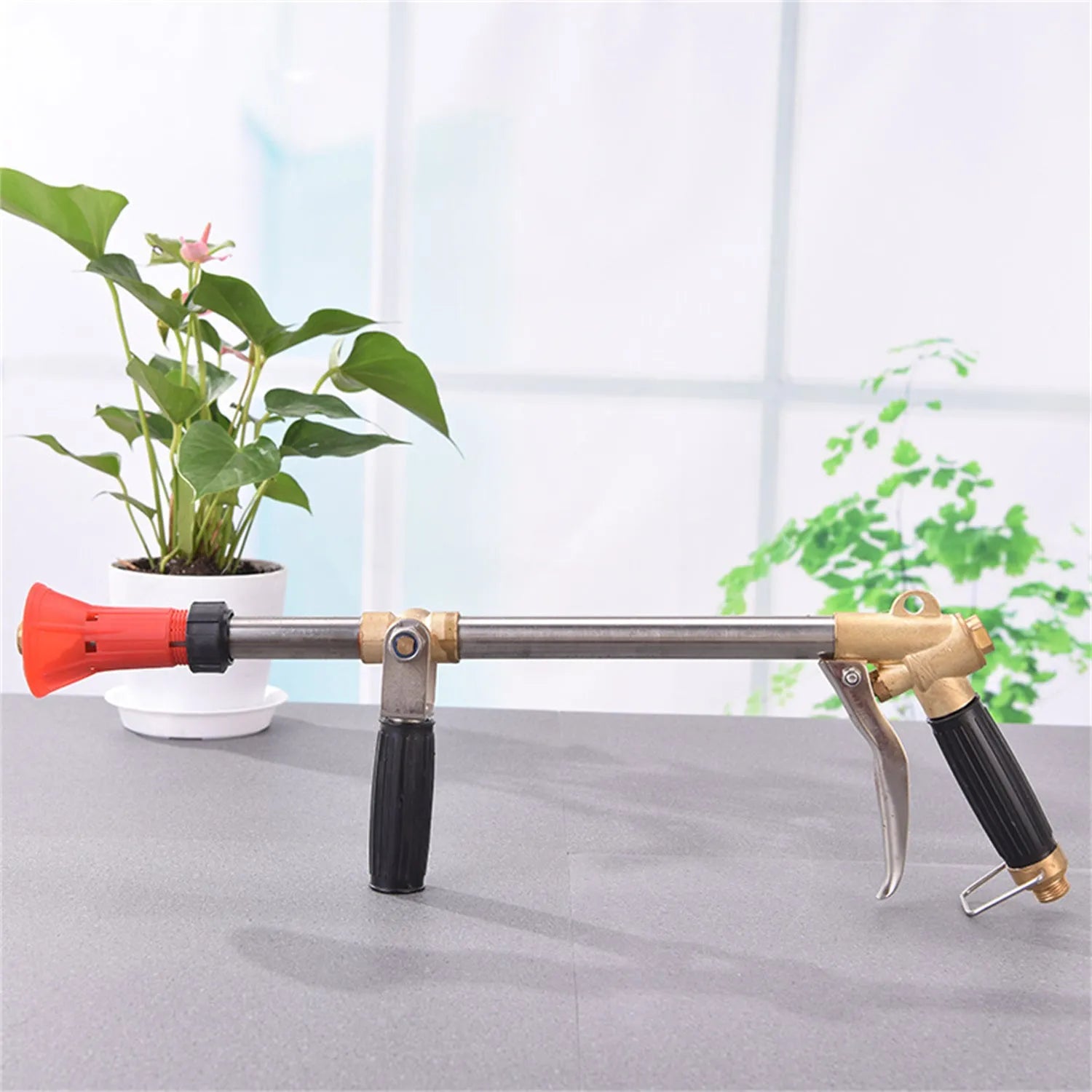 Submachine gun style agricultural spray gun for pesticide application