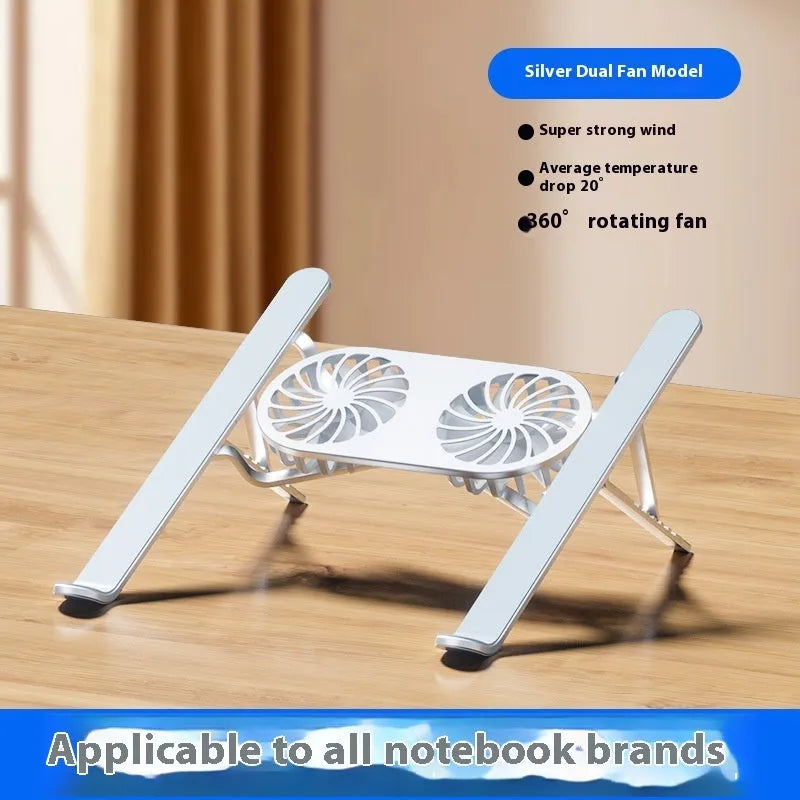 Silver aluminium folding laptop stand with twin cooling fans deployed on a desk.