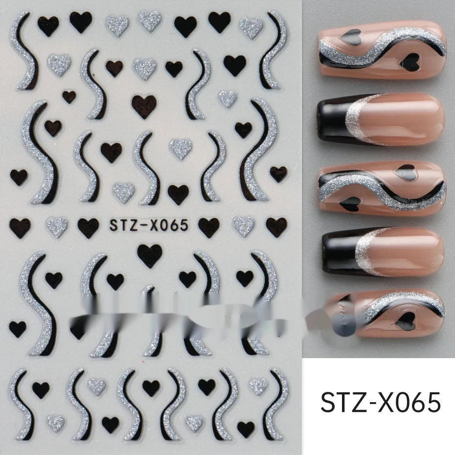 Cartoon love pattern nail art sticker decals in black and silver colours on a plastic sheet.