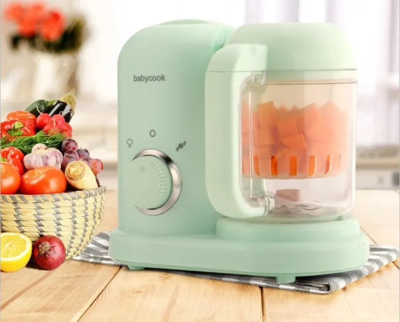 Baby food processor and steamer blender with dual mixing blades in green or pink colours