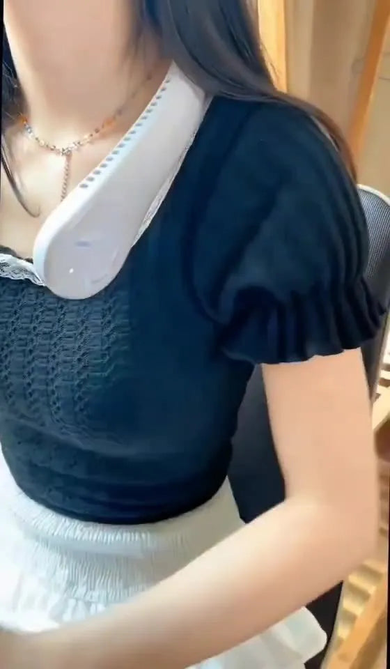 Pink USB rechargeable bladeless neck fan hanging on a mannequin neck