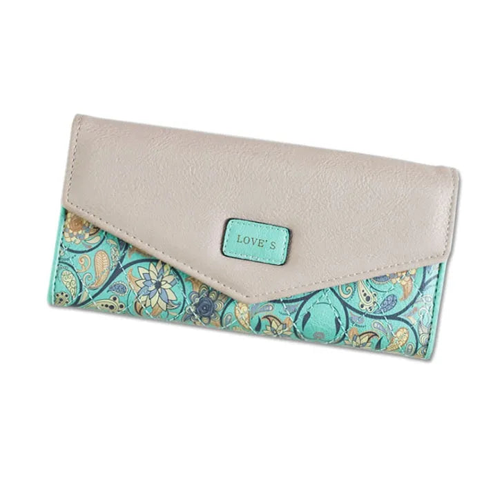 Three-fold women's leather wallet with buckle clip closure in five colour options showing dimensions