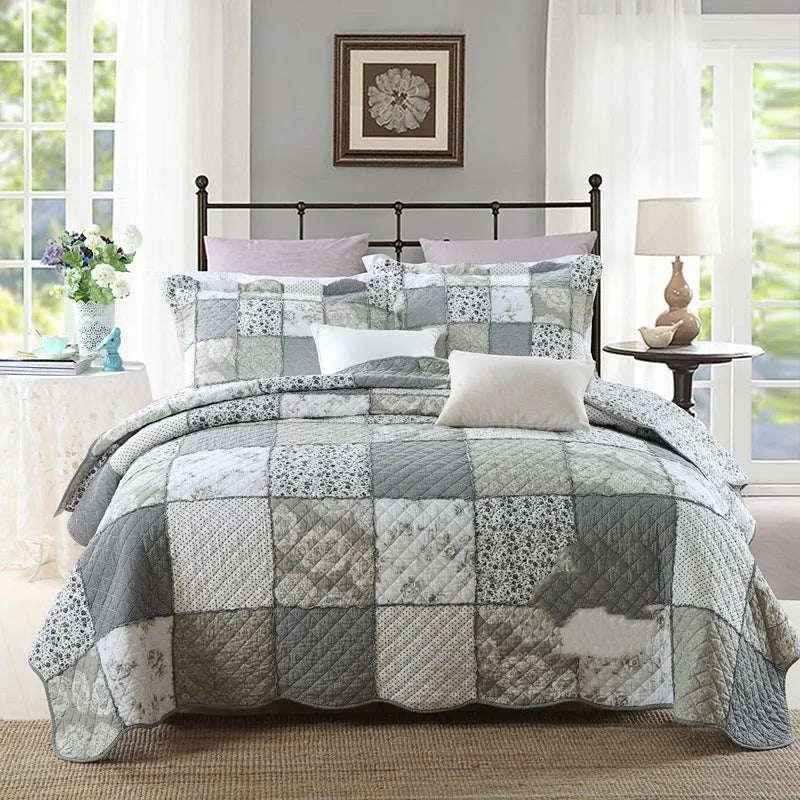 Pure cotton quilted bedspread three-piece set with pillowcases on a bed