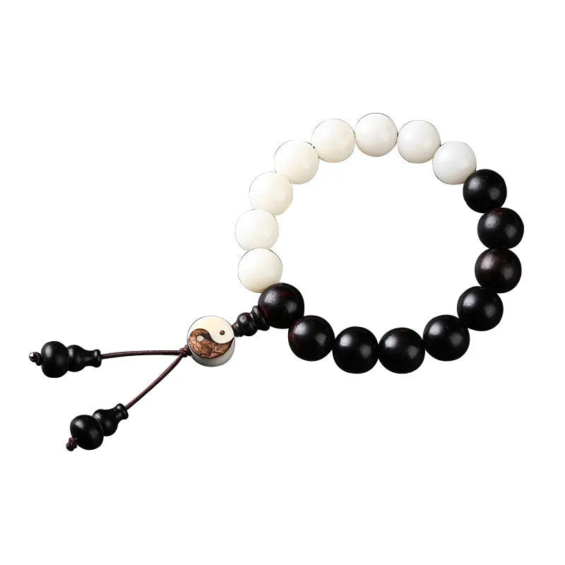 Handmade retro bracelet with White Corypha Umbraculifea Blackwood and Mixed Yuan Beads on a lanyard.