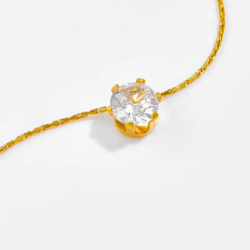 Gold titanium steel necklace with six-claw round zircon pendant, mixed gemstone inlay and bamboo chain