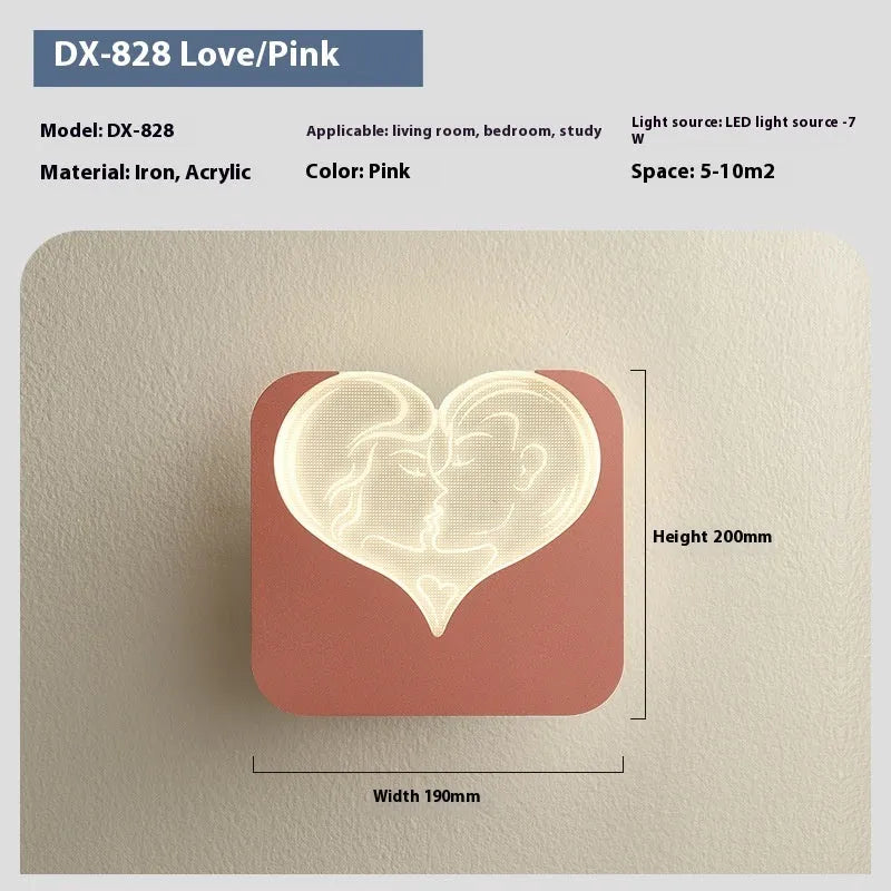 Modern cream bedside wall lamp with tricolour LED light and acrylic shade in love heart design