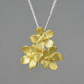 Sterling silver Myosotis Sylvatica flower pendant with electroplated gold or silver finish, pastoral style.