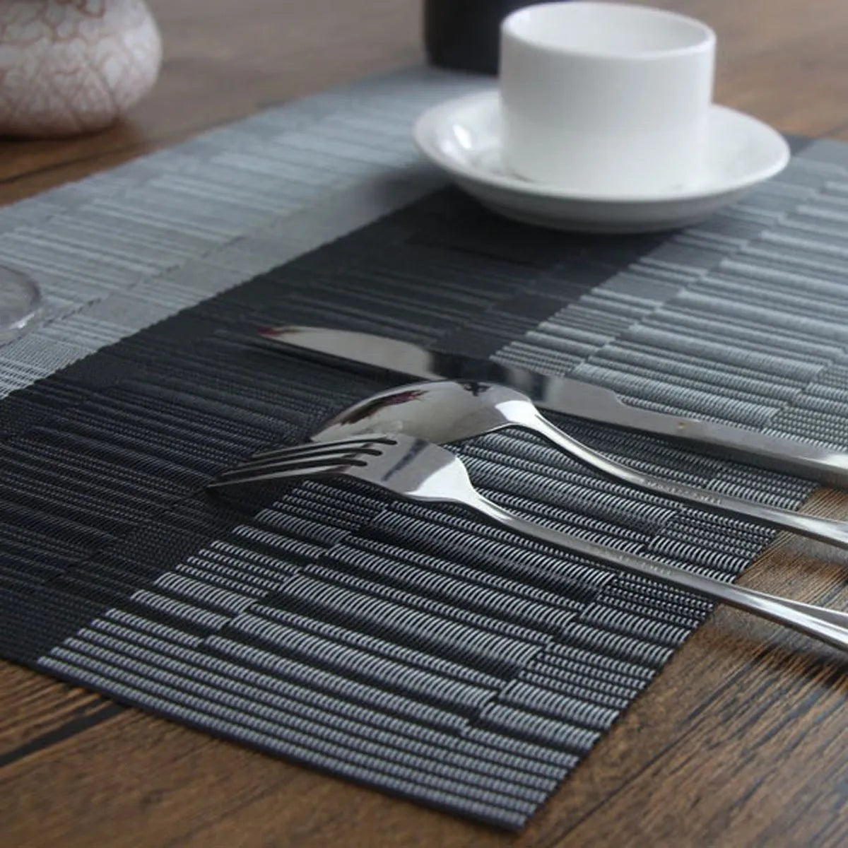 PVC non-slip placemat in a modern simple style on a kitchen counter.