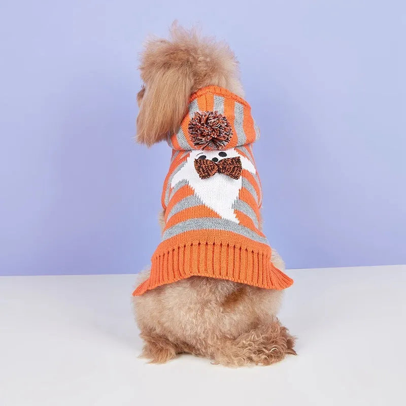 Orange striped Halloween pet sweater with knitted acrylic construction and hooded fur ball detailing