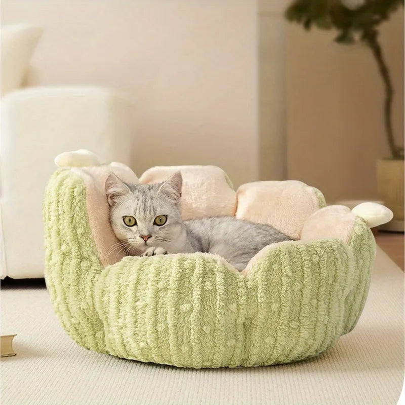 Soft green cactus-shaped pet kennel for cats and dogs on a wooden floor.