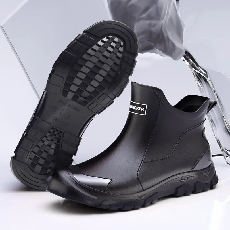 PVC outdoor wading shoes in black and red with a non-slip plastic sole and short-tube design.