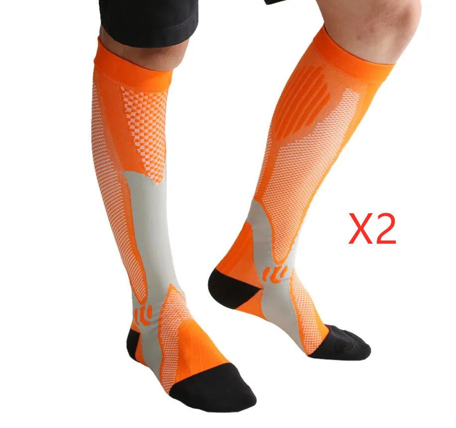 A pair of graduated compression socks for men and women in an athletic style, shown in a colour option like black or blue.
