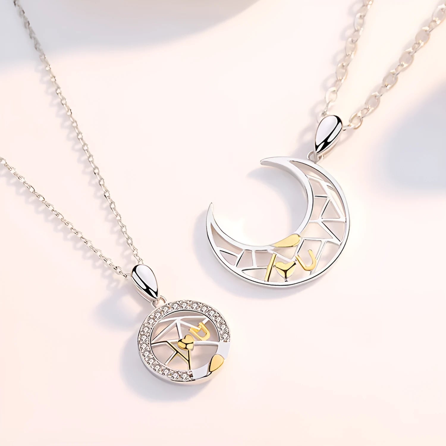 Sun Moon Tooth Couple Necklace showing electroplated copper pendant with cross chain